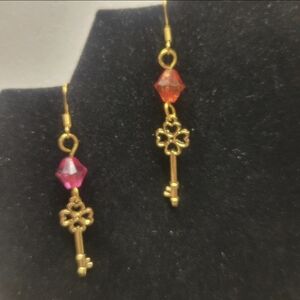 Hand Crafted Gold and Pink Bicone Bead Earrings with Gold Key Charm
